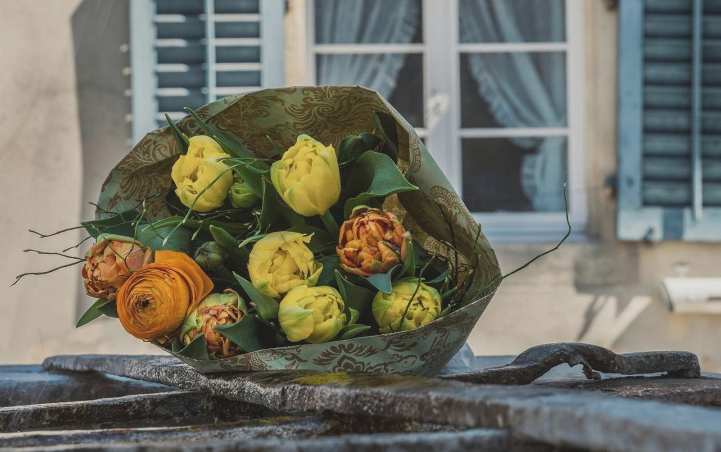 Participant working on a structured floral composition